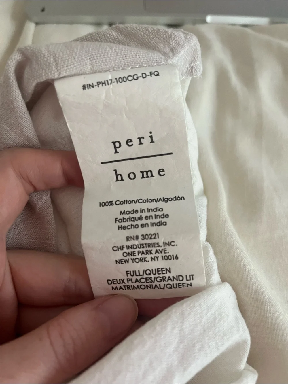 White duvet cover with purple embellishments